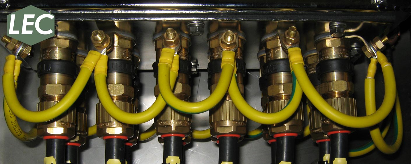 Cables entering one of our hazardous area control panel's, complete with hazardous Ex glands, earth bonding and cable identification.